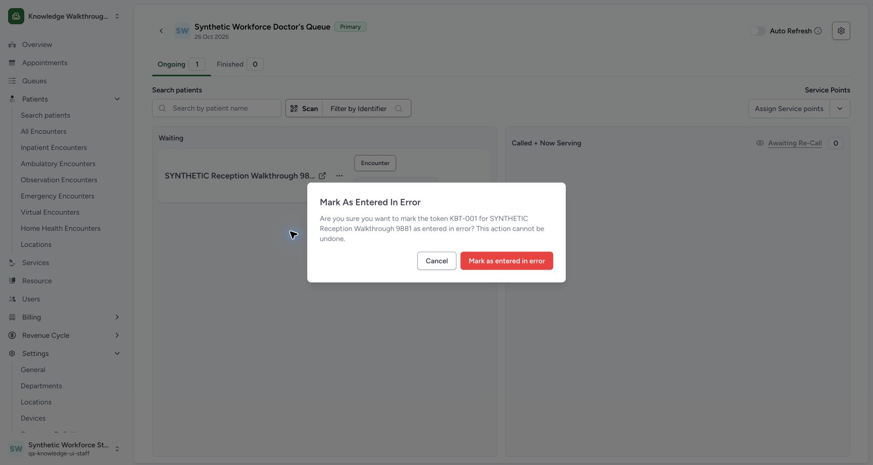Actual entered-in-error warning identifies the token and patient; neutral Cancel is focused and confirmation remains unclicked. Actual fictional MANSOQ Staff teaching.